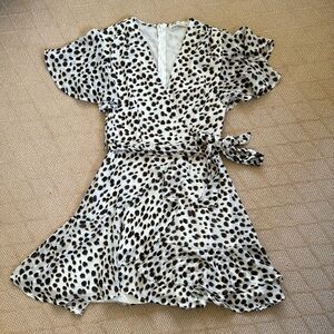 Adorable leopard print stationary wrap dress